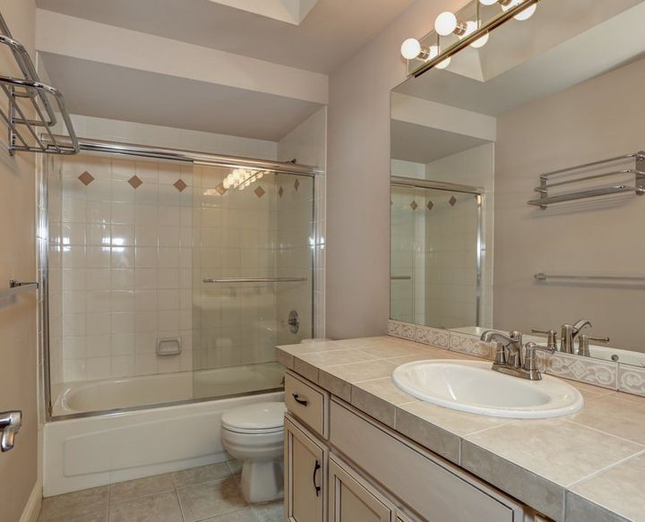 Bathroom Remodel — Bathroom with Vanity Cabinet and Shower in Saxonburg, PA