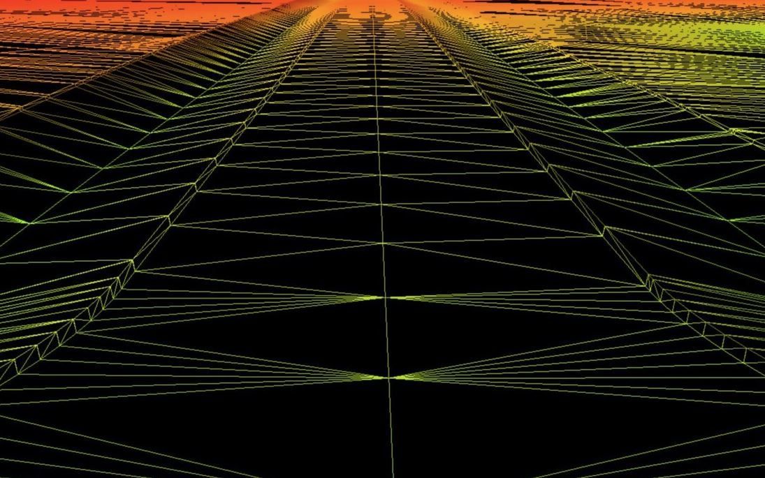 A calculator is sitting next to a model of a building and money.