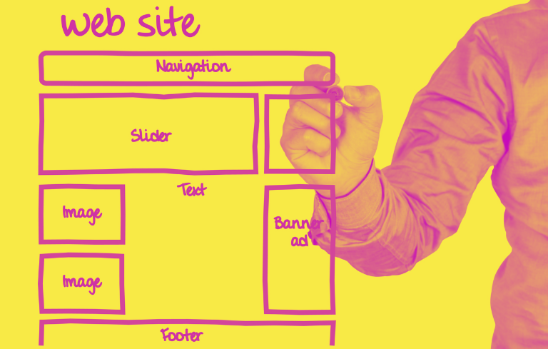 A man is drawing a web site on a yellow background with a marker.