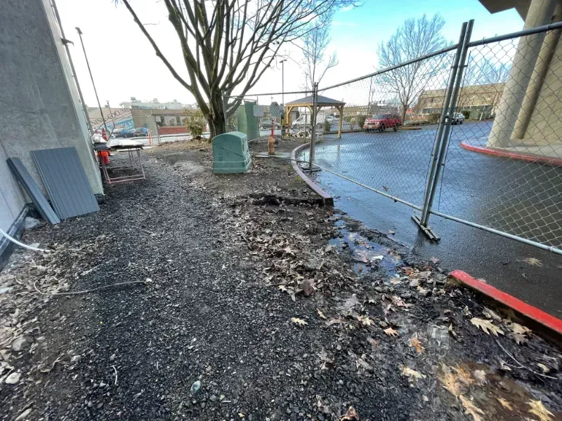 An aerial view of a construction site in front of a building in Vancouver, WA