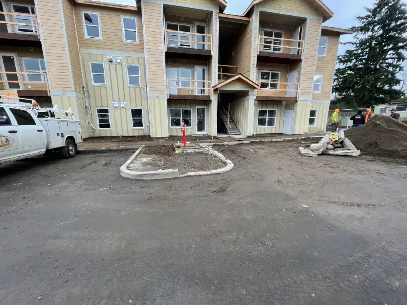 An aerial view of a residential area with lots of buildings and parking lots in Vancouver, WA