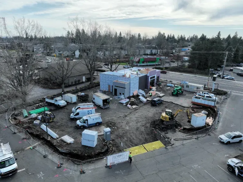 An aerial view of a construction site with a building under construction in Vancouver, WA