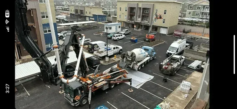 An aerial view of a residential area with lots of buildings and parking lots in Vancouver, WA