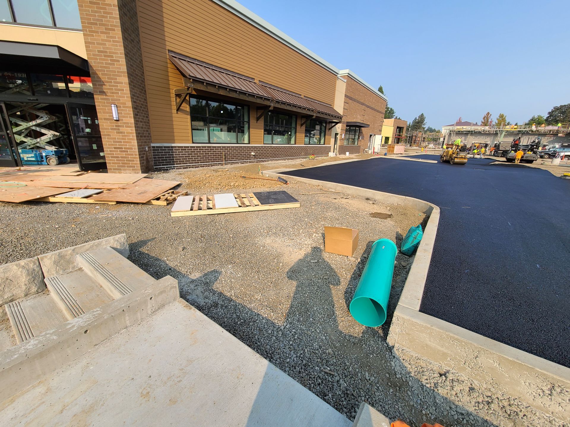 A construction site with a brick building in the background in Vancouver, WA