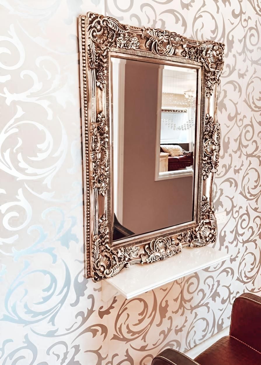 Mirror With a Gold Frame is Hanging on a Wall — Lavie Hair & Beauty in Ciccone, NT