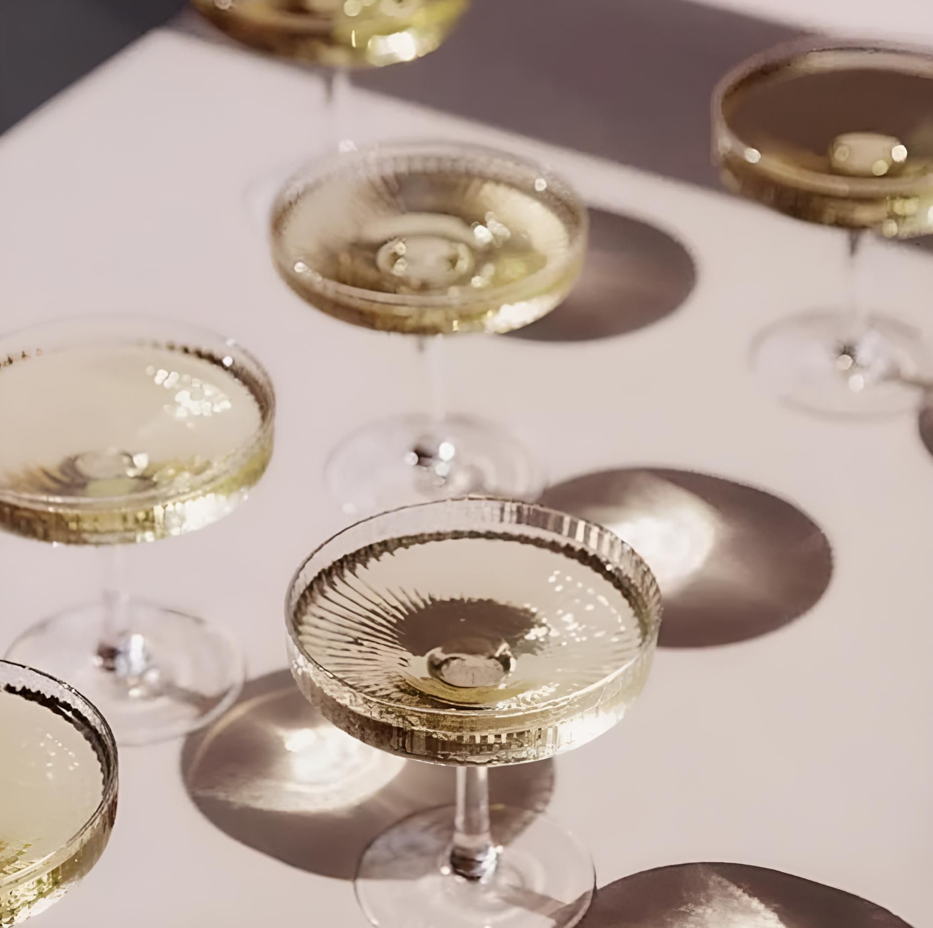 Several Champagne Glasses Are Lined Up — Lavie Hair & Beauty in Ciccone, NT