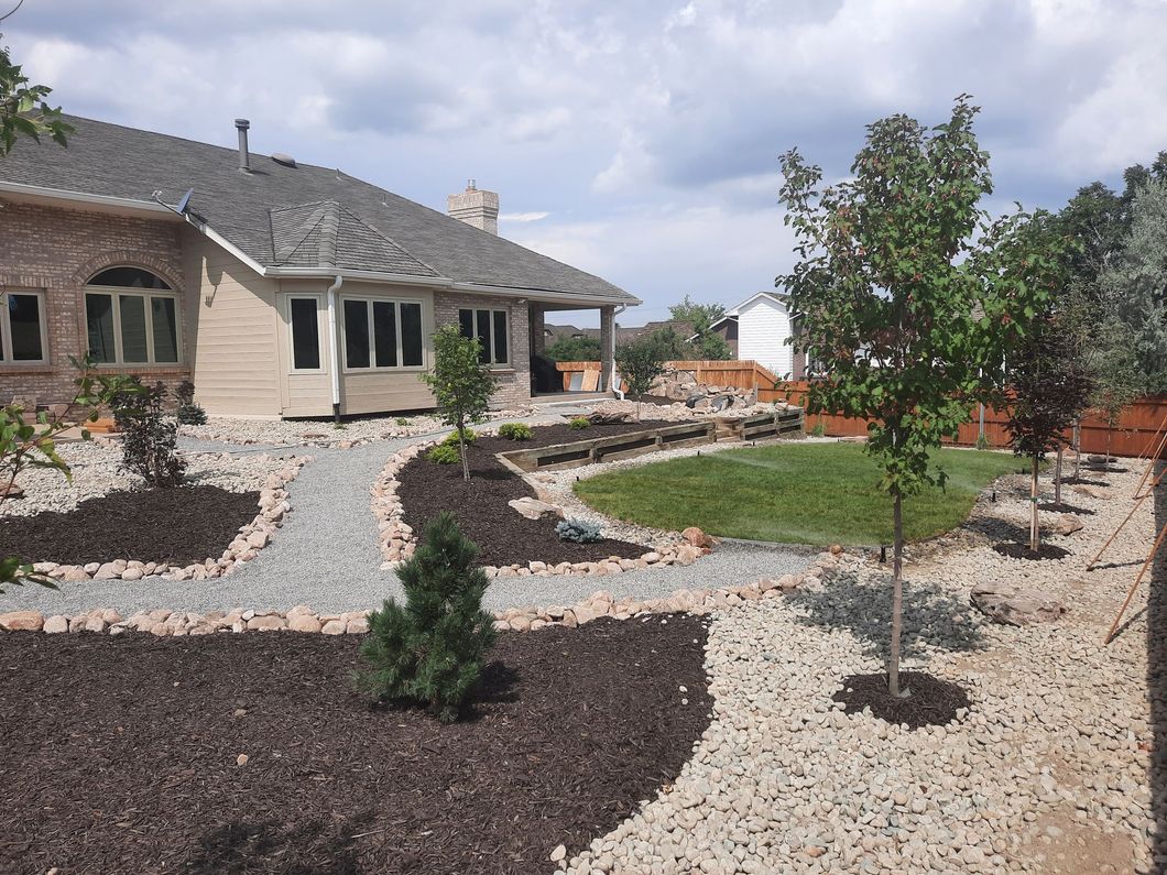 A large house with a walkway leading to it