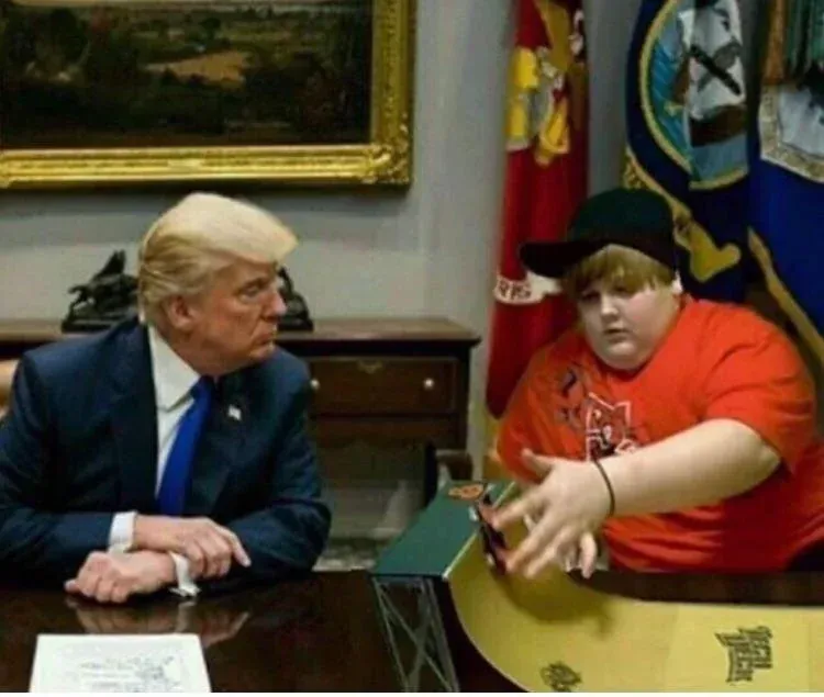 image of a child showing donald trump his tech deck tricks