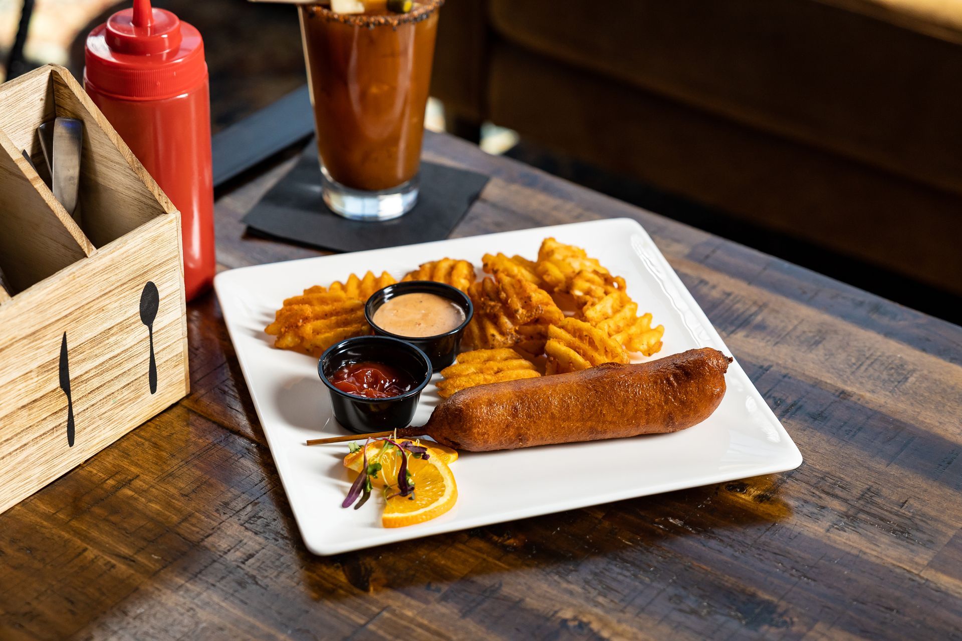 Tony Tenderoni plate with waffle fries. Located in downtown Denver Colorado near Coors Field