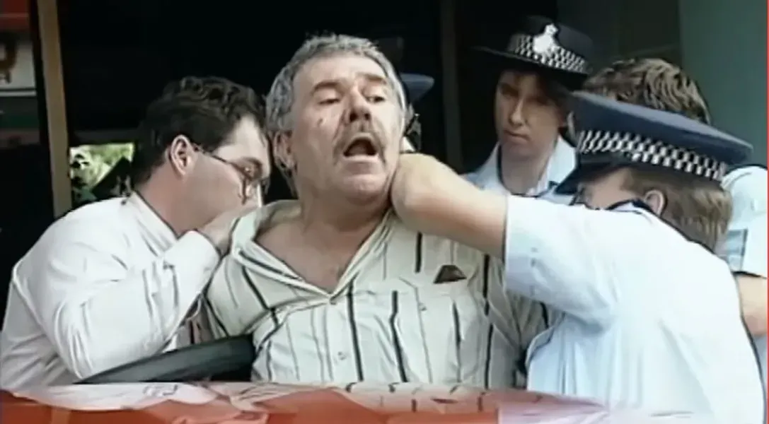 meme image of a man getting arrested