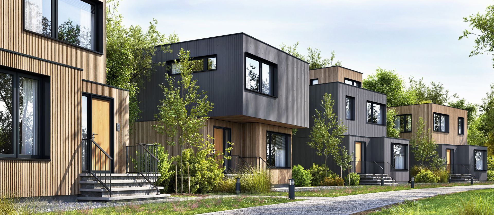 A row of houses sitting next to each other in a residential area.