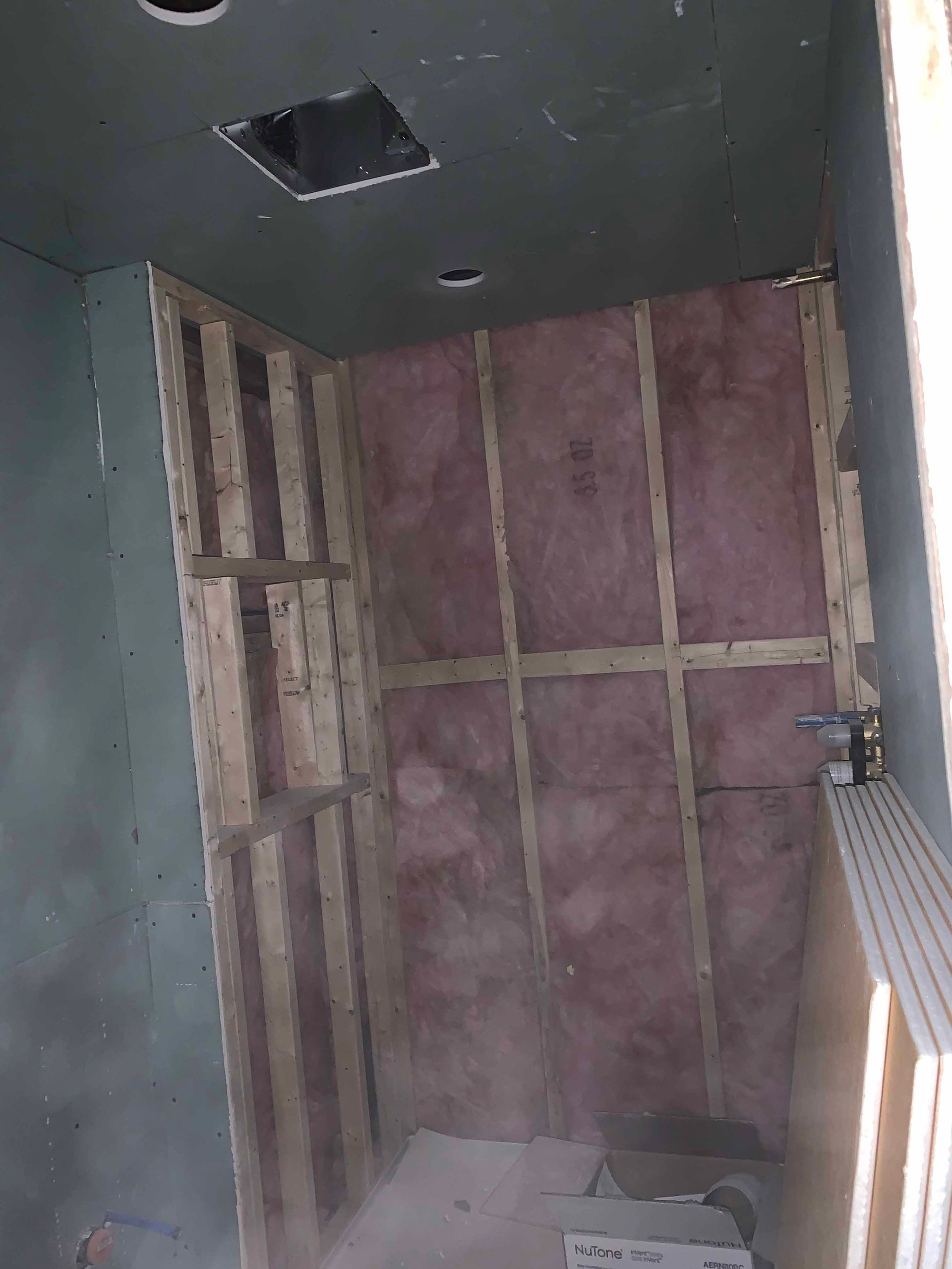 There is a hole in the ceiling of the room.