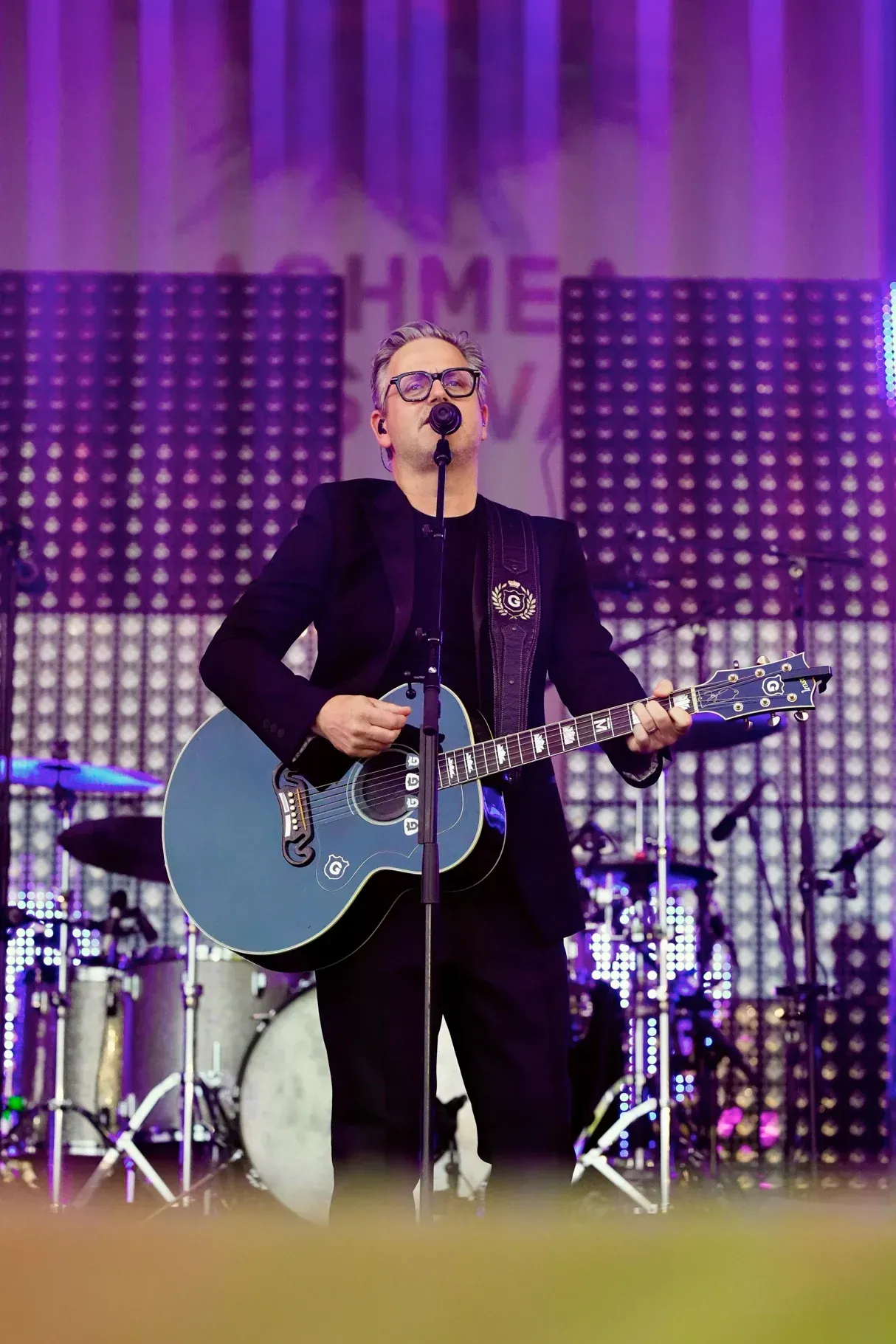 Guus Meeuwis treedt op tijdens Achmea Festival Rosmalen, sfeer- en muziekfotografie vol beleving.