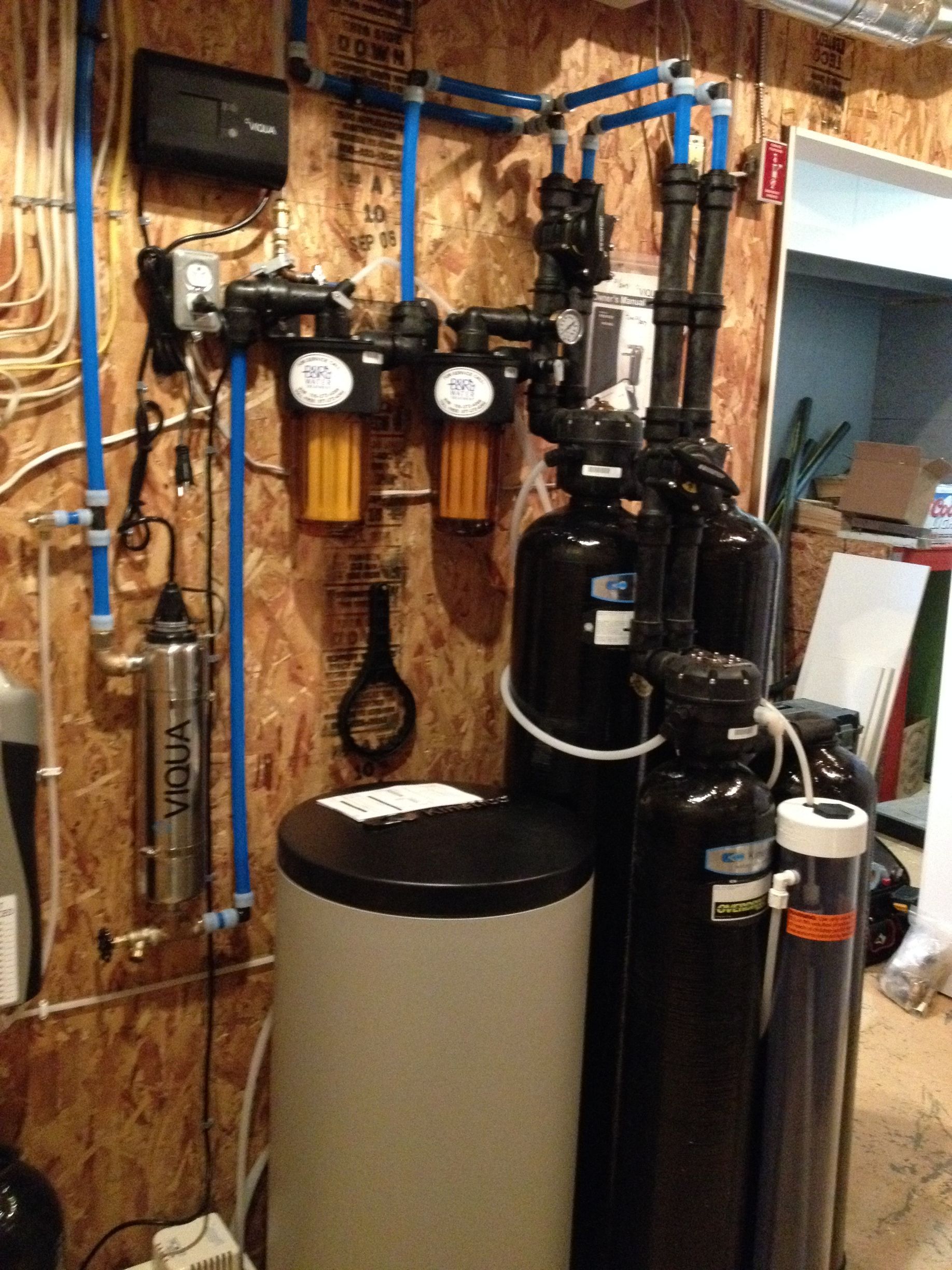 A water treatment system is installed in a basement