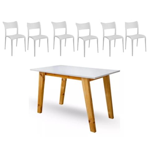 Una mesa blanca con patas de madera junto a una fila de sillas blancas.