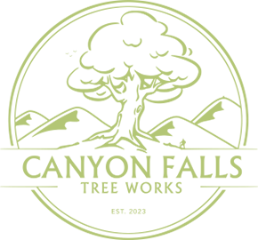 Canyon Falls Tree Works Logo - light green Tree & Mountains graphics in a circle