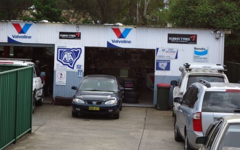 Happy customer of our engine repairs drives her car in Corrimal