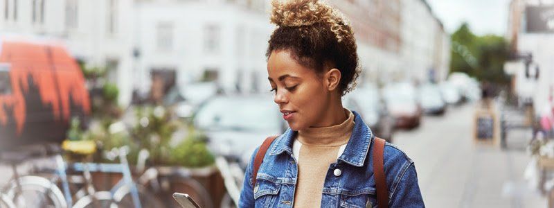 young-adult-looking-at-phone