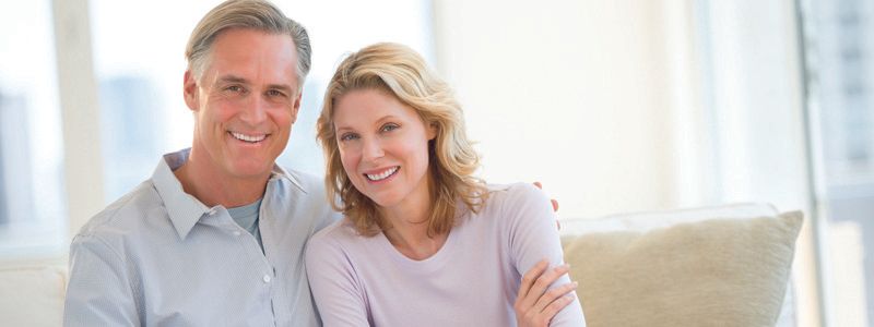 couple-sitting-on-couch