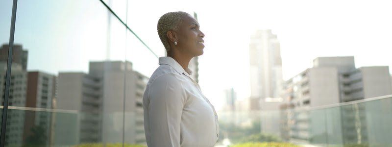 lady-standing-outside-building