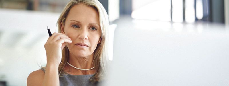 lady-thinking-at-computer