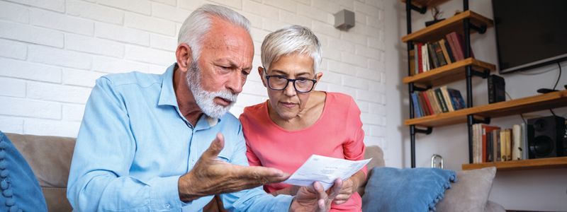 couple-looking-at-paperwork