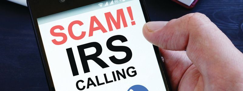 Hand holding a smartphone displaying