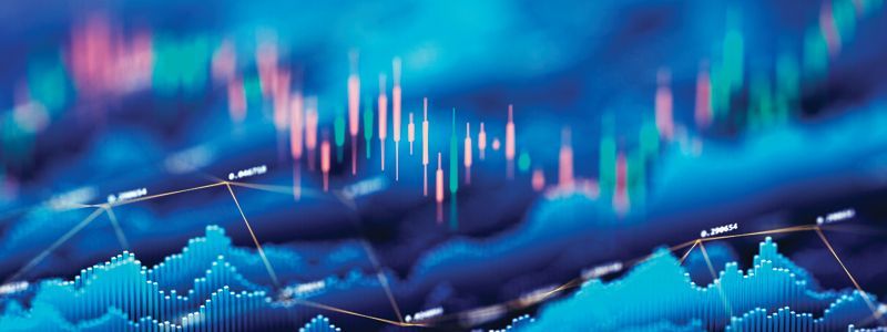 Stock market graph with fluctuating lines in blue, pink, and green.