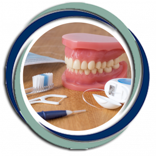 Dental hygiene tools: teeth model, toothbrush, floss, interdental pick, and face mask.