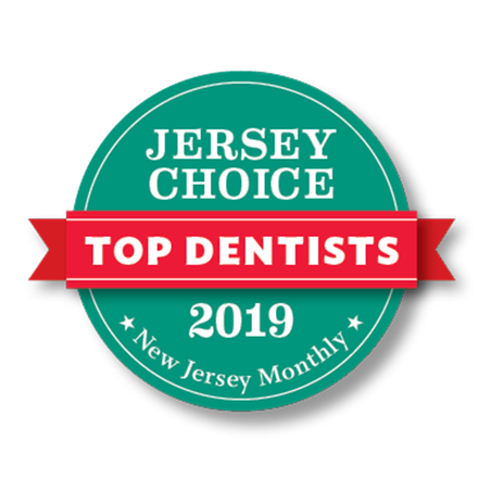 Jersey Choice Top Dentists 2019 badge, green circle, red banner, white text, from New Jersey Monthly.