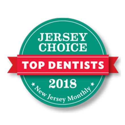 Jersey Choice Top Dentist 2018 award badge in teal and red, from New Jersey Monthly.