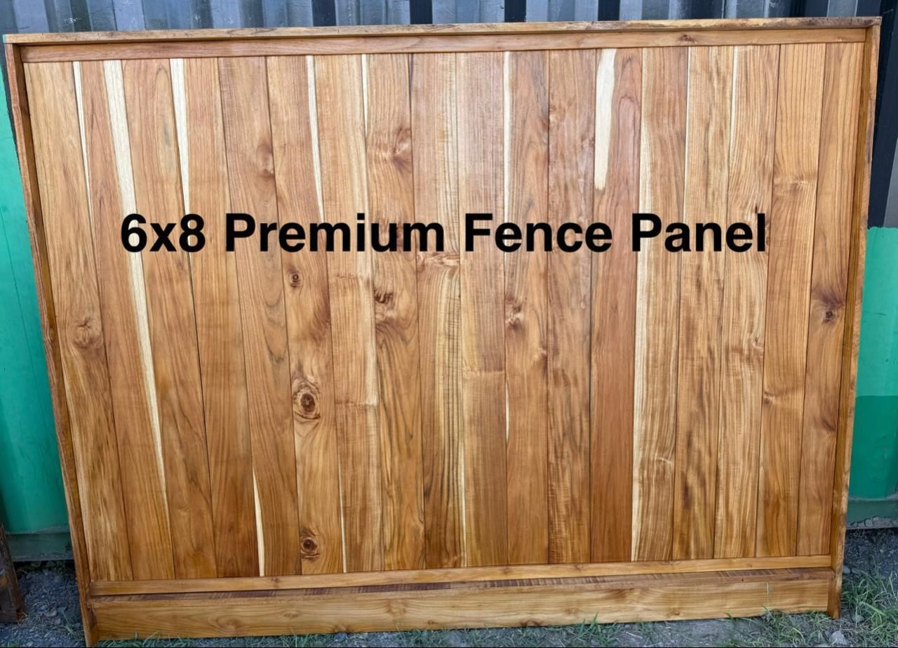 Brown wooden 6x8 premium fence panel against a green background.