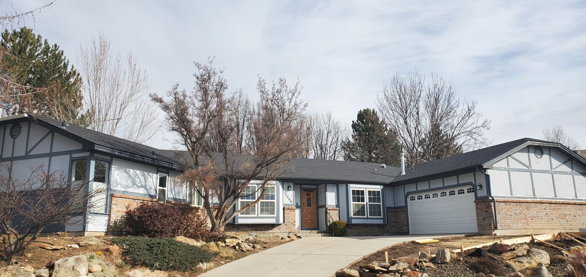 A large house with a garage and a driveway