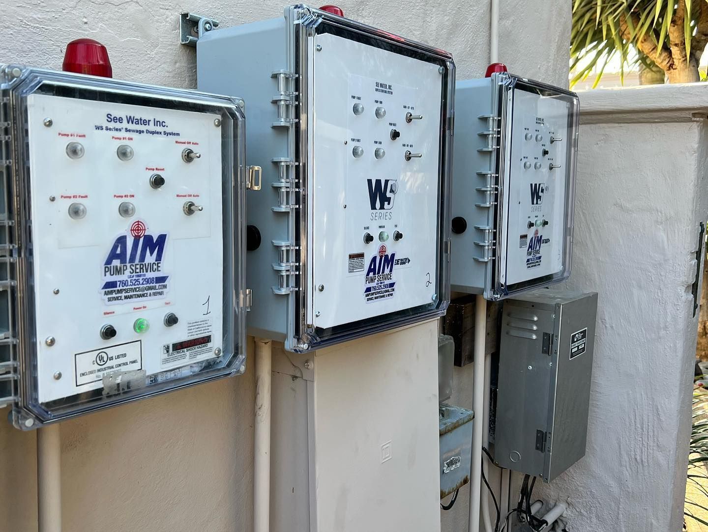 Three industrial control boxes with 