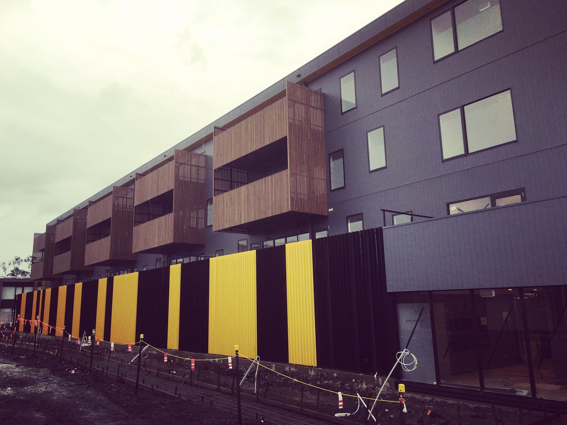 A large building with a lot of windows and balconies