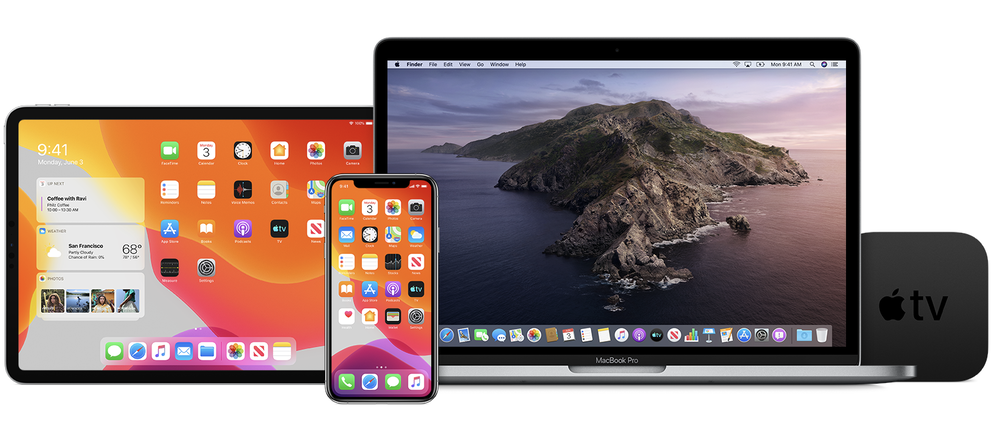 A laptop , tablet , and phone are sitting next to each other.
