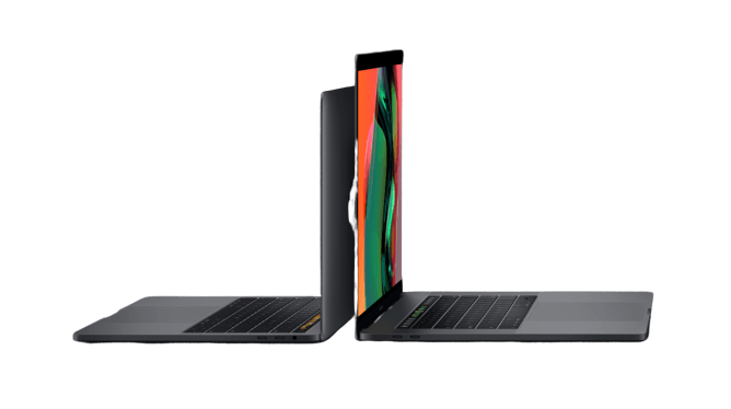 Two laptops are sitting next to each other on a white background.