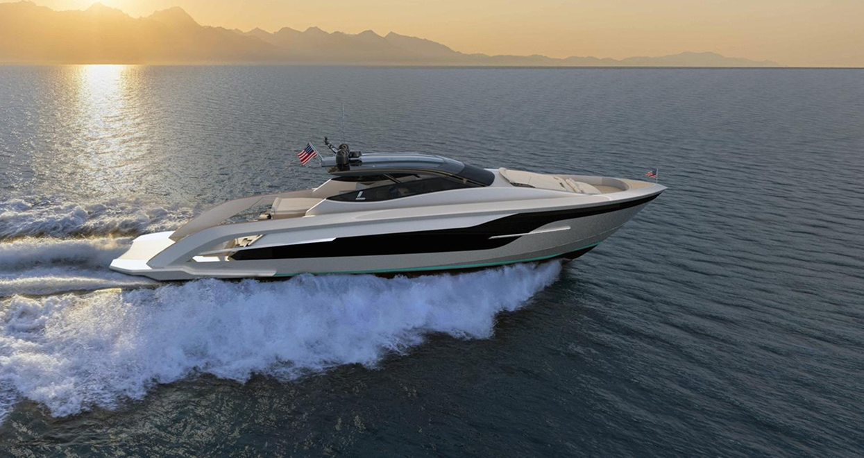 Luxury motor yacht speeding across the water with a setting sun and mountain backdrop.