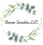 Logo for Skincare Specialists, LLC. Text in script font, surrounded by a watercolor wreath of green leaves.