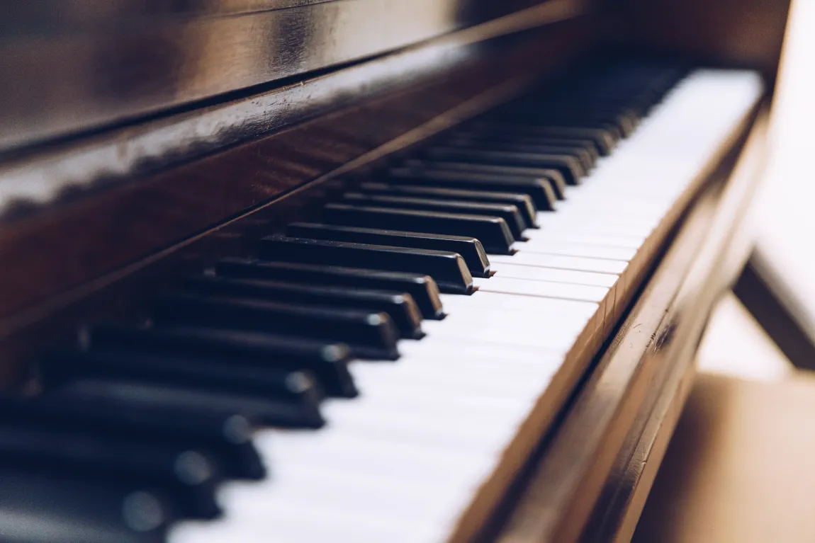 a close up of piano keys