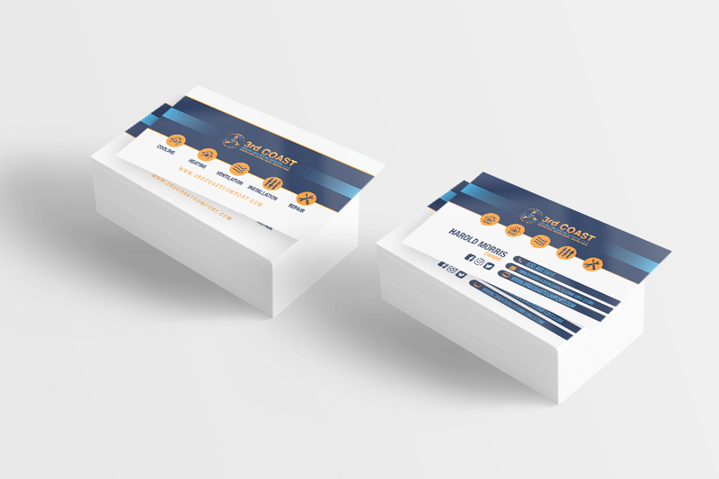 Stacks of business cards, blue and gold design, white background.