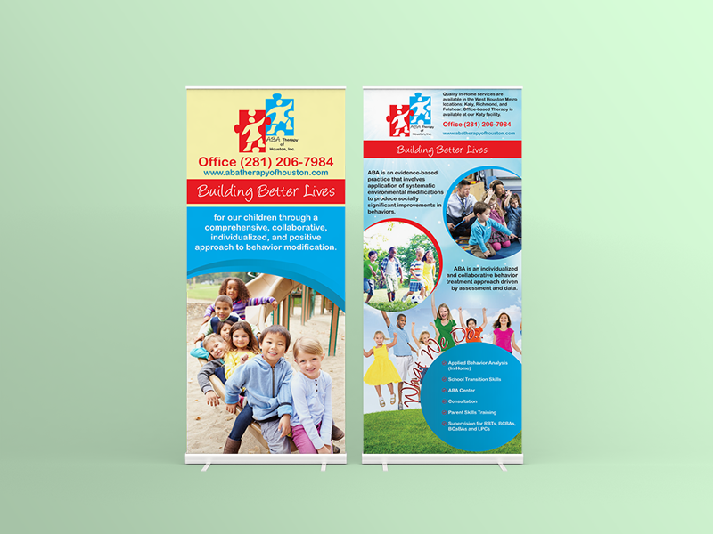 Two roll-up banners: colorful, with kids and logo, promoting