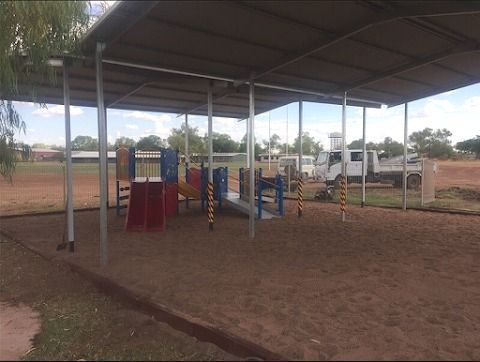 A Playground With a Covered Area and a Truck Parked in the Background — Pedersen NT Pty Ltd in Ciccone, NT