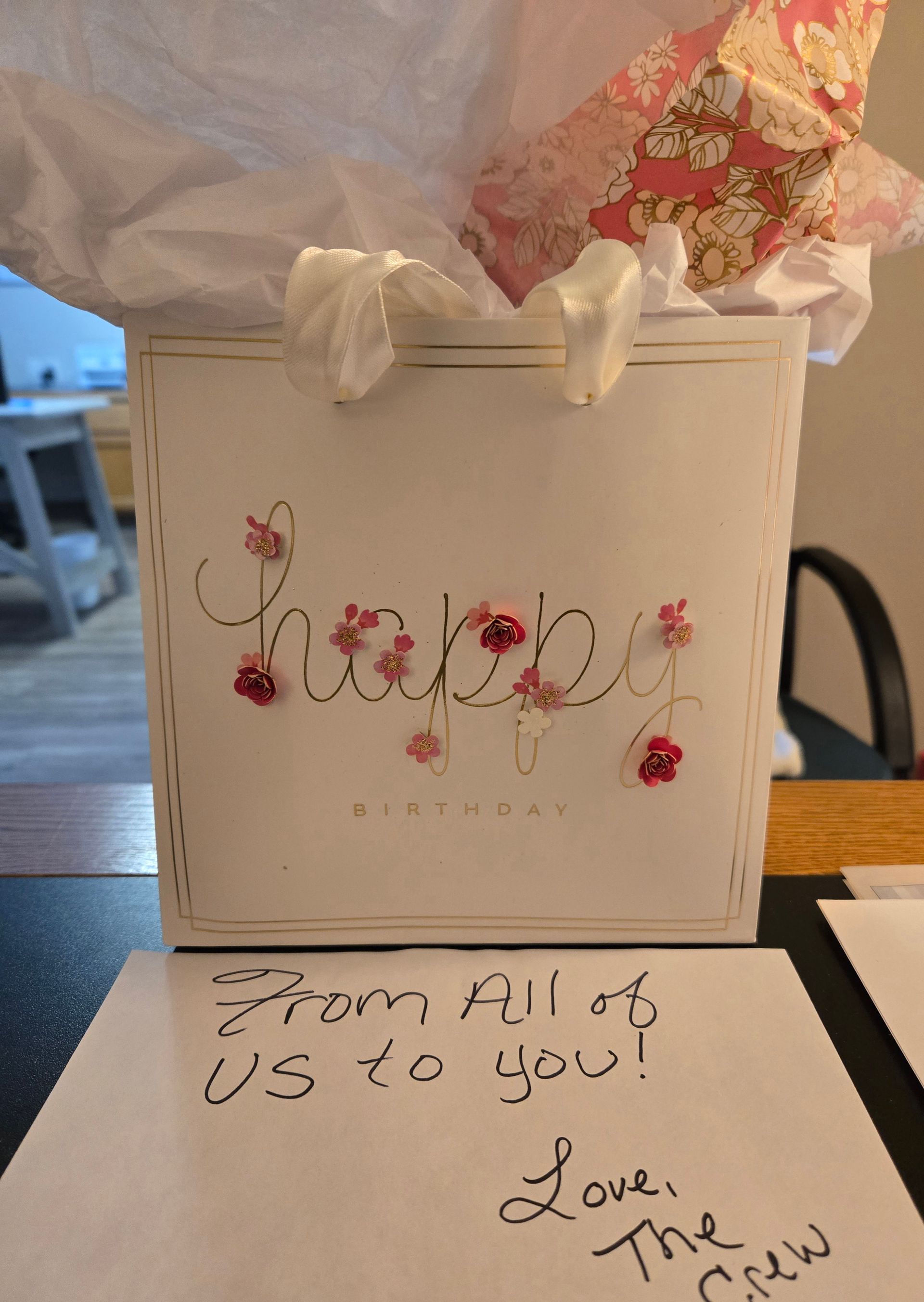 A shelf filled with a variety of fruits and vegetables wrapped in plastic.