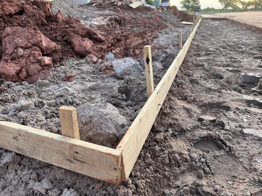 Image showing concrete forms held in place with wooden stakes