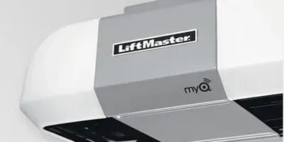 LiftMaster garage door opener with gray and white casing; “myQ” logo visible.