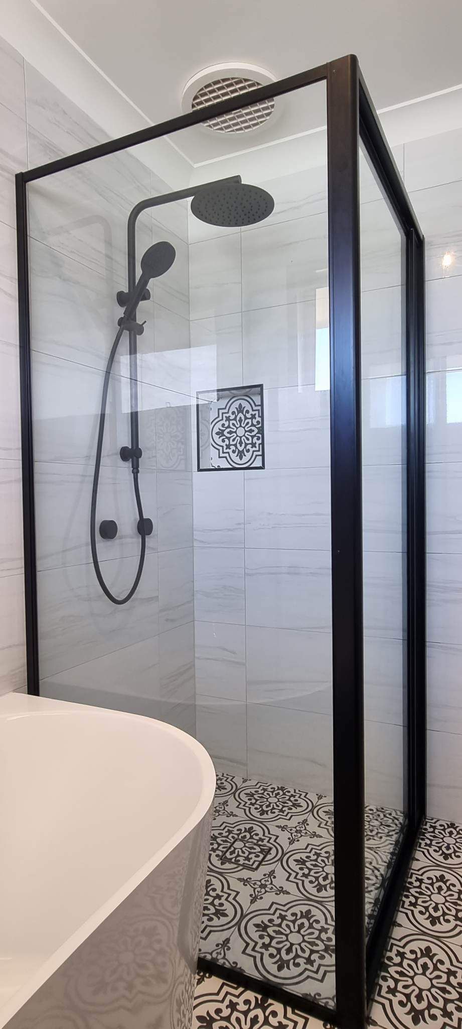 A Bathroom With A Walk In Shower And A Bathtub — Nambucca Glass in Nambucca Heads, NSW