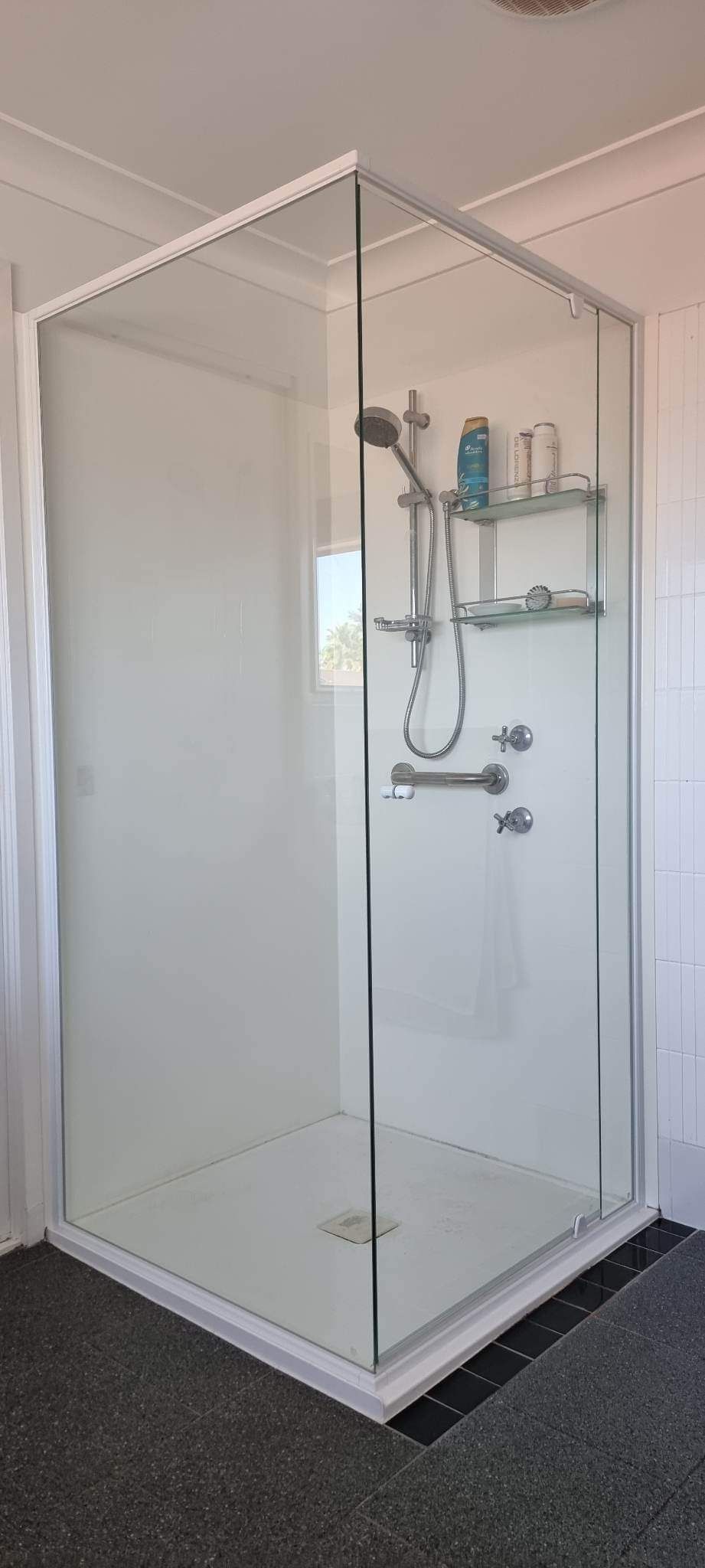 A Bathroom With A Shower Stall And A Shower Head — Nambucca Glass in Nambucca Heads, NSW