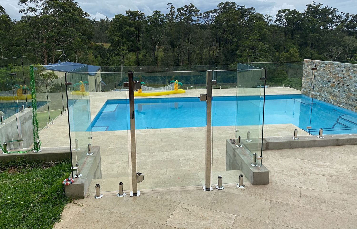 A Glass-Fenced Swimming Pool