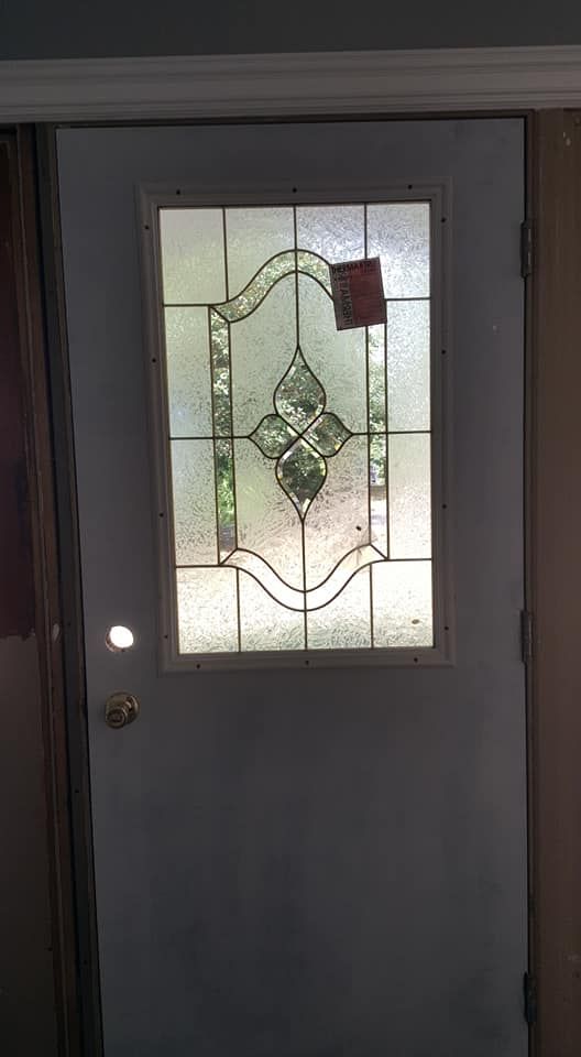 White door with stained glass window